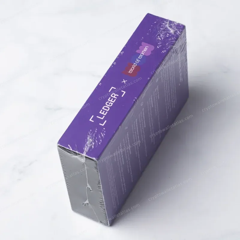Ledger Nano S Plus World of Women Purple - box side panel with co-branded logo